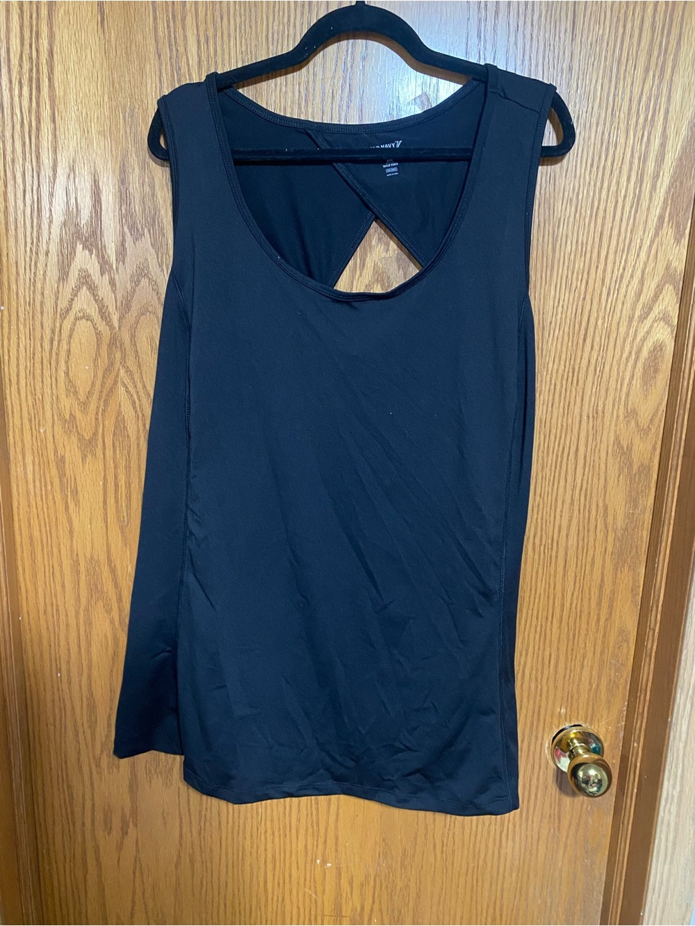 Black Sleeveless Workout Tank Top with Cross-Back Detail size 4 new with tags